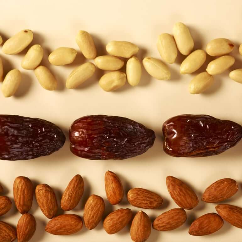 peanuts, dates and almonds grouped together